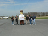 The campaign committee poses for a picture with the Power Man